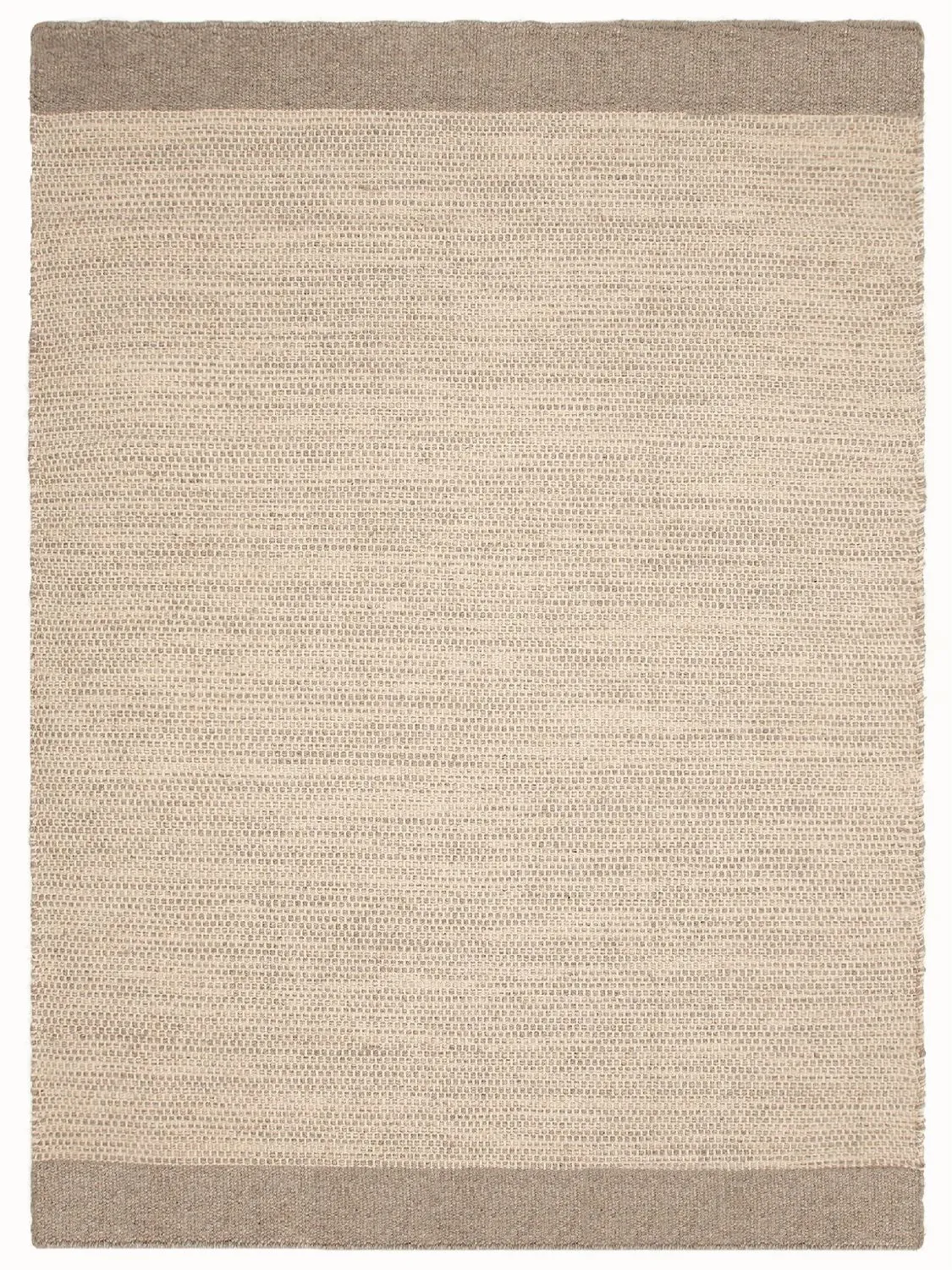 Vorher: handgewebter Teppich in Beige mit braunen Kanten als Freisteller, das Originalbild aus dem Shop